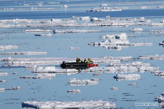 Xuelong 2 works in Antarctica's Prydz Bay to recover, deploy sea-based buoys