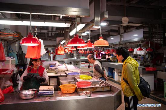 Local fishmonger witnesses great changes in Macao in past 20 years