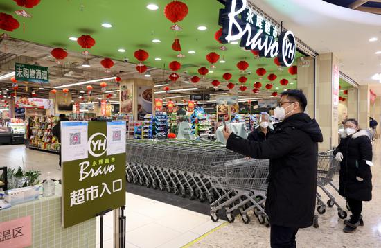 Beijing removes nucleic acid test requirements at public venues