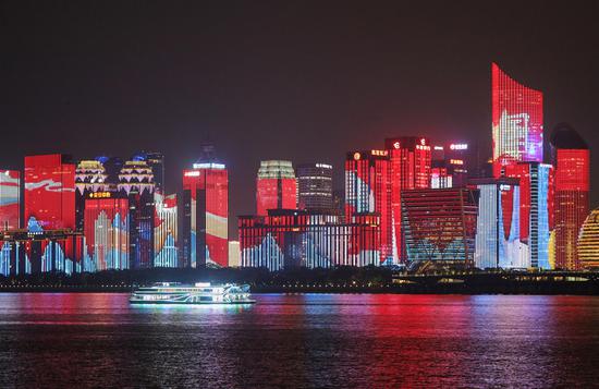Lightshow illuminates Hangzhou to greet the forthcoming Asian Games