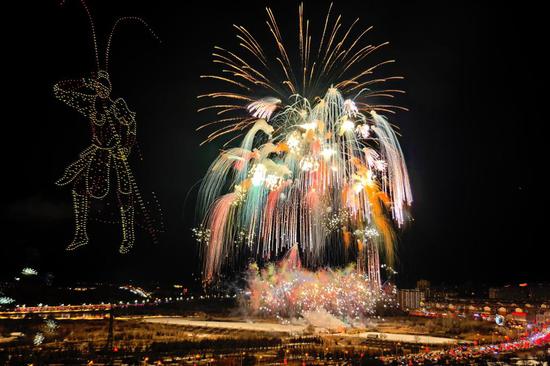 Drone show integrated with pyrotechnic displays creates spectacular nightscape
